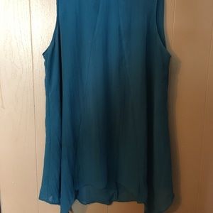 Teal blue green with gold collar detail and tie closure at back. Sheer layered